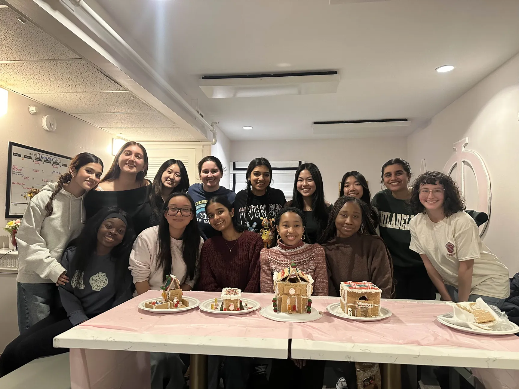GWC members decorating gingerbread houses